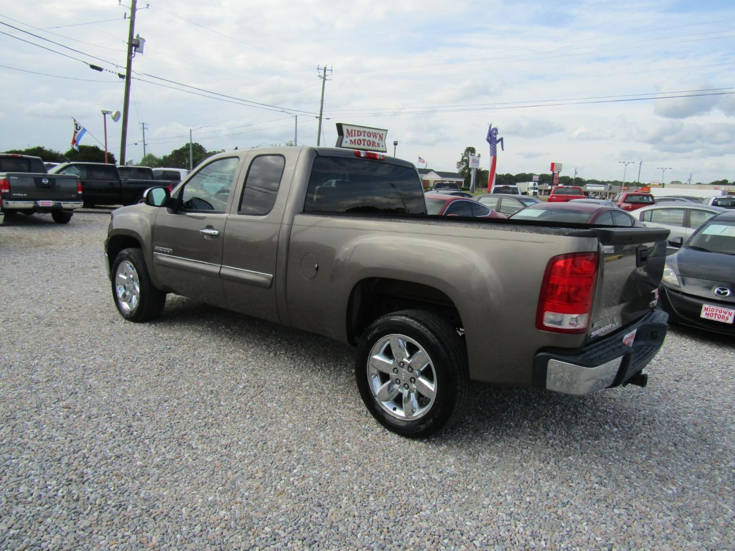 2012 Bronze /Tan GMC Sierra 1500 SLE Ext. Cab 2WD (1GTR1VE04CZ) with an 5.3L V8 OHV 16V FFV engine, Automatic transmission, located at 15016 S Hwy 231, Midland City, AL, 36350, (334) 983-3001, 31.306210, -85.495277 - Photo#5